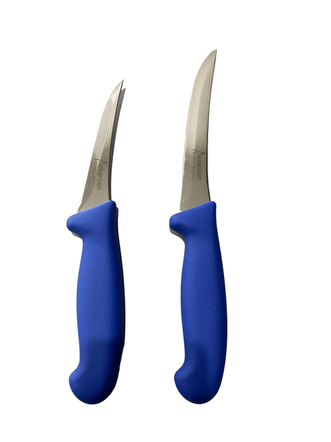 a pair of blue scissors sitting next to each other